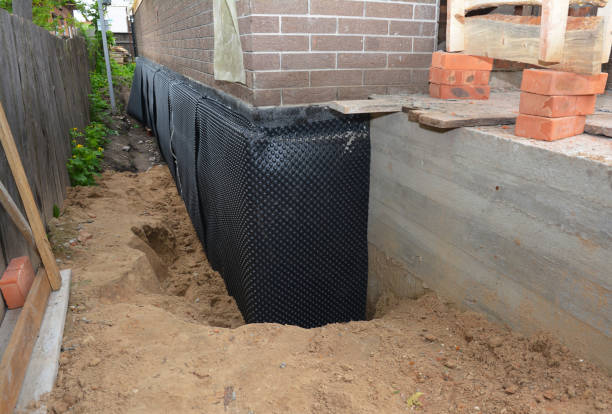 SJ Waterproofing Pros technician performing targeted Sump Pump Installation assessment in Ambler, PA